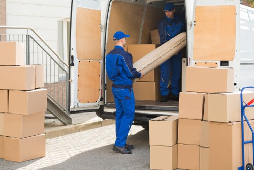 Experienced mover with a van navigating local streets