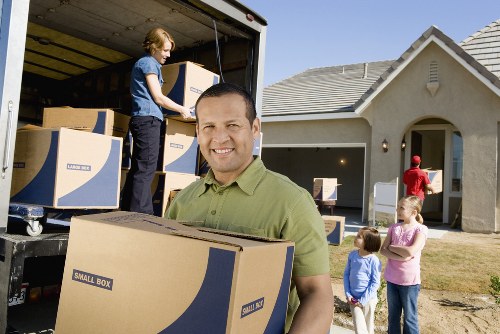 Movers Removals team packing household items