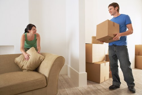 Movers efficiently loading items into a truck