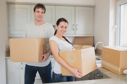 Professional movers assisting with packing